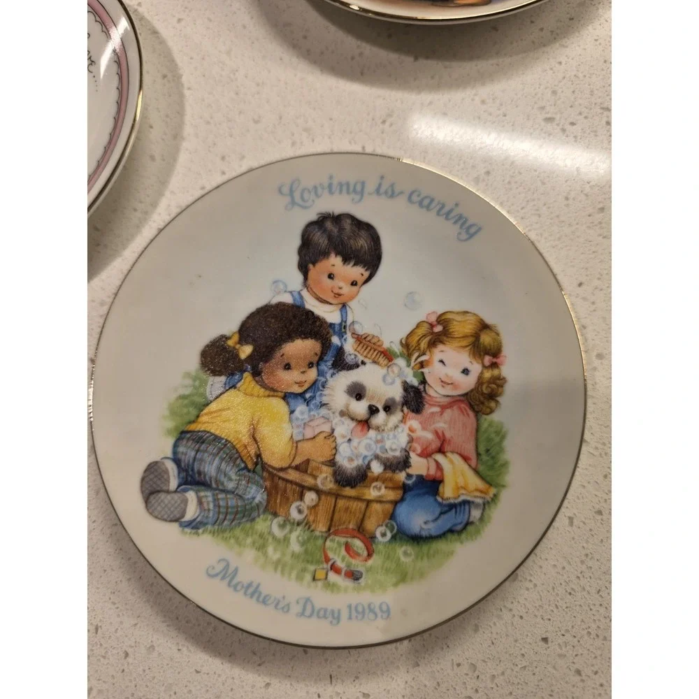 Set of 8 Avon Collectable Plates 1980s